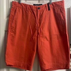 Orange flat front shorts